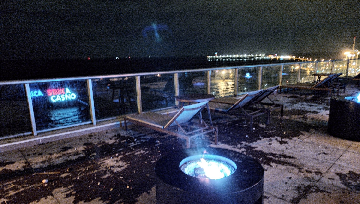 Grand Suite terrace above the sea at night
